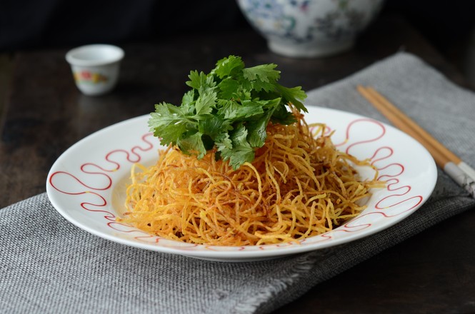 香酥土豆絲的做法-酸甜味炸菜譜-易網(wǎng)健康養(yǎng)生網(wǎng) 香酥土豆絲的做法-酸甜味炸菜譜