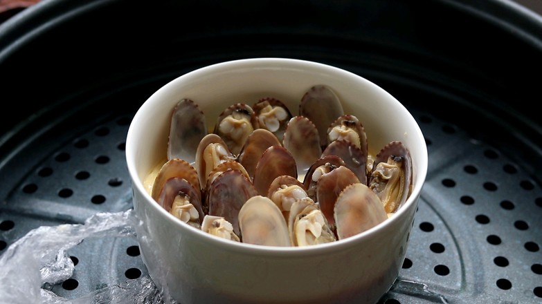 花甲燉蛋的做法-咸鮮味蒸菜譜-易網(wǎng)健康養(yǎng)生網(wǎng) 花甲燉蛋的做法-咸鮮味蒸菜譜