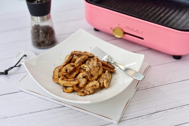 黑椒煎蘑菇的做法-咸鮮味煎菜譜-易網健康養生網 黑椒煎蘑菇的做法-咸鮮味煎菜譜