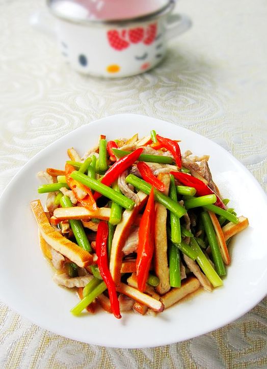 香干蒜薹炒肉絲的做法-家常味炒菜譜-易網健康養生網 香干蒜薹炒肉絲的做法-家常味炒菜譜